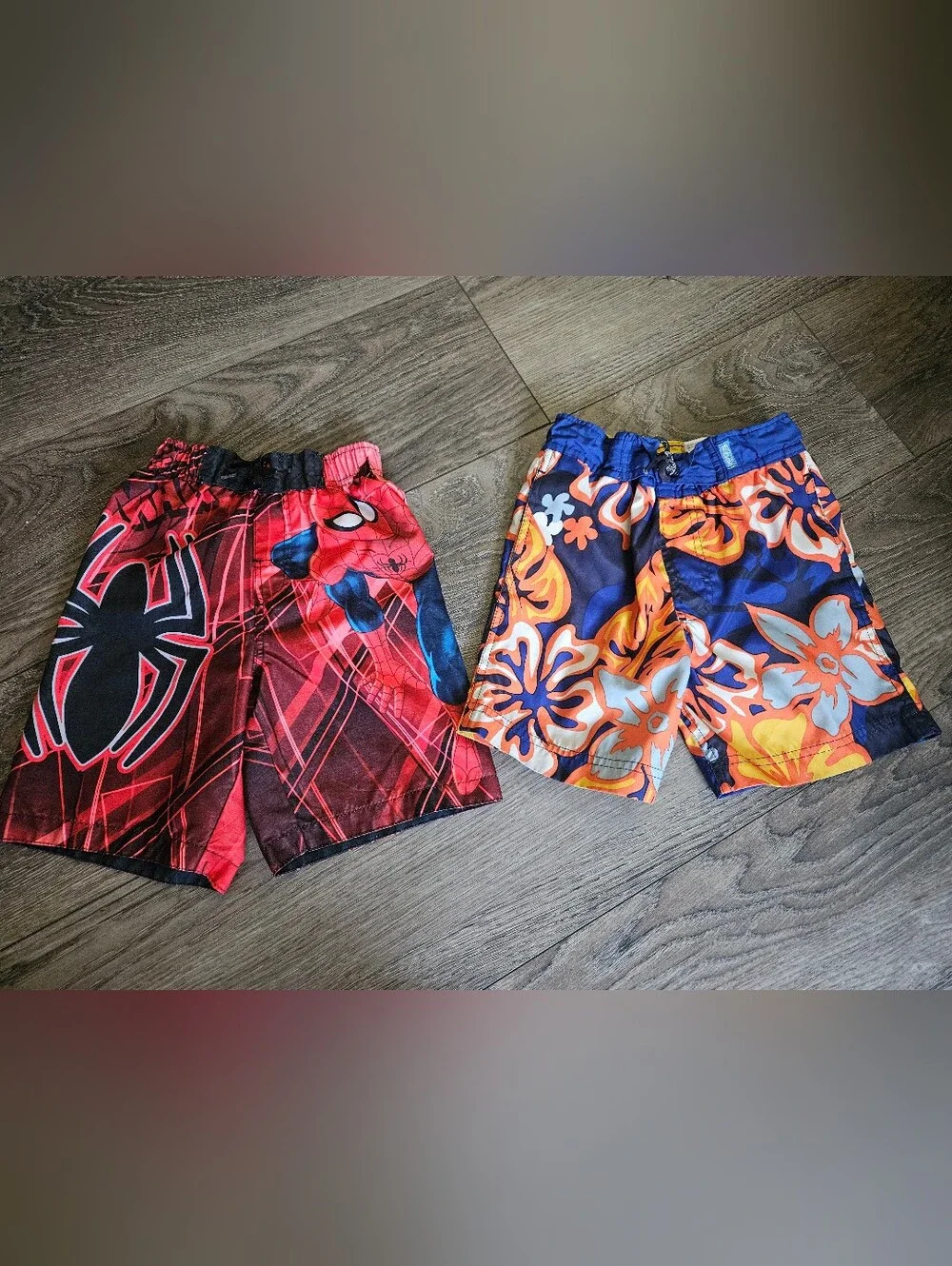 Pair Of Spider-Man Red Swim Trunks and Blue-Orange Floral Swim Shorts - Kids